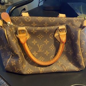 Louis Vuitton satchel purse unauthenticated